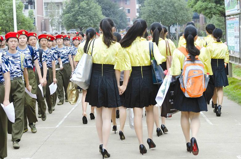 PHOTOS: Lessons in how to be a lady provide a welcome alternative to military training